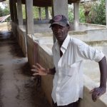 ...Mr. Villegard's colleague, Mr. Jean Batiste, shows one of the former pig-pens where the MPP successfully bred a more robust pig race from the American Hog and some remaining Creole pigs that farmers had been able to hide in the mountains.